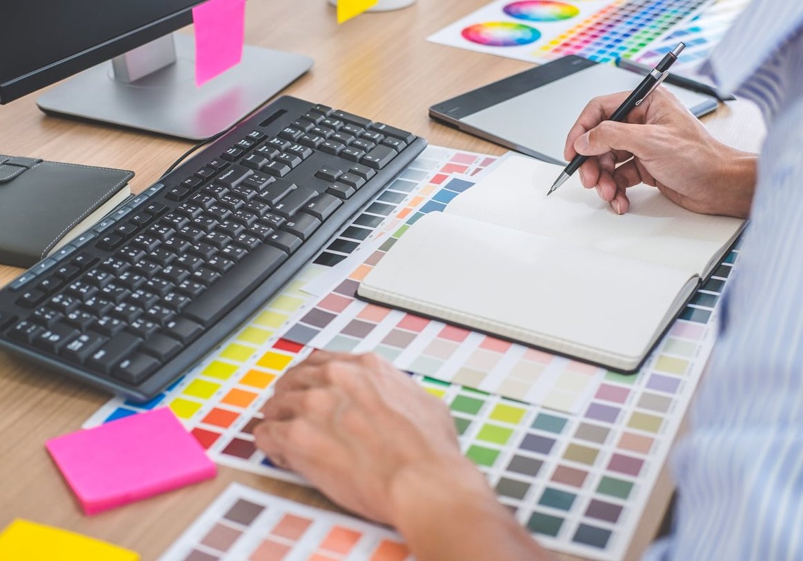 graphic designer sketching notebook